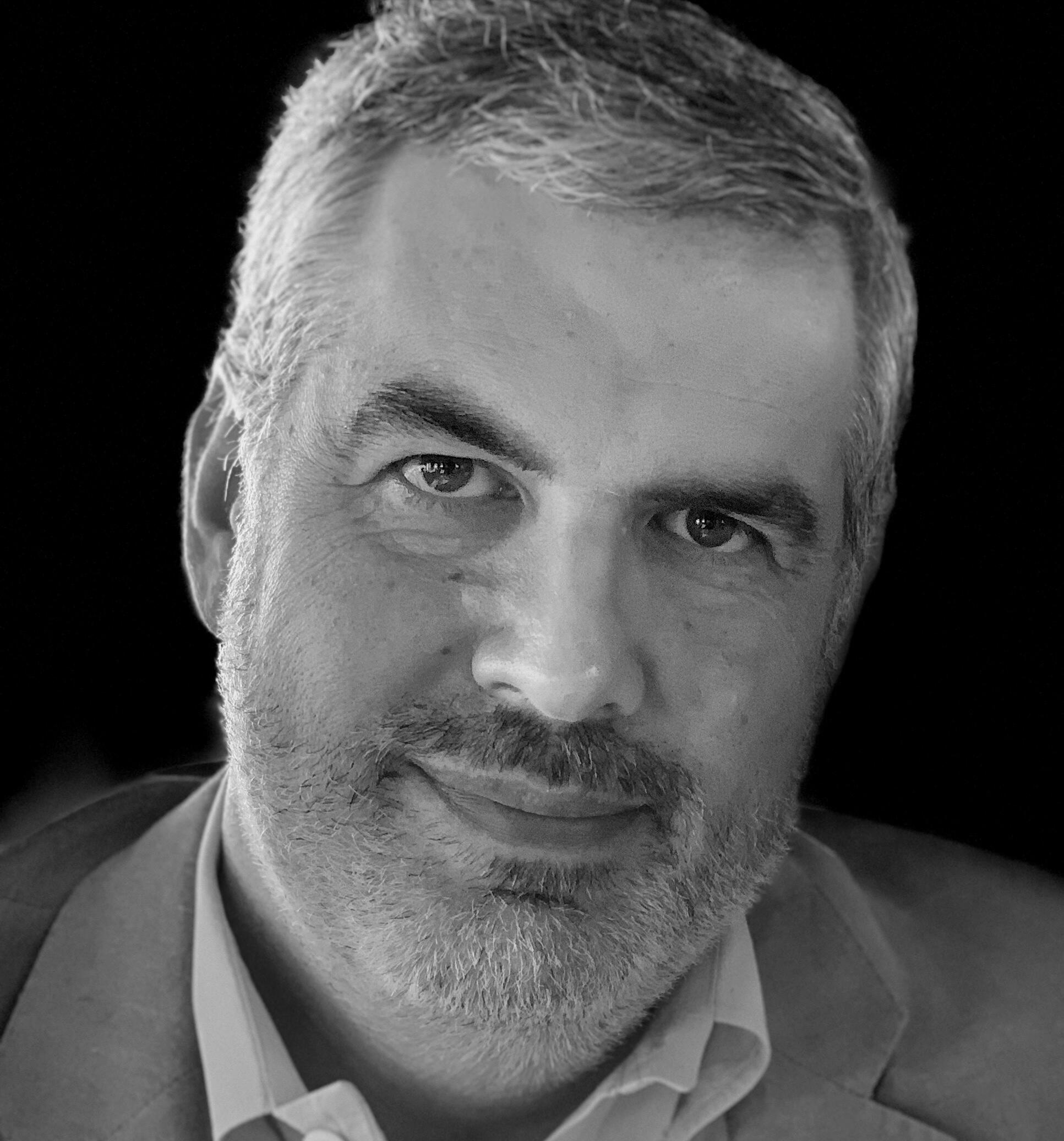 a picture in black & white of Michael Mosher's face